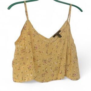 Forever 21 light yellow cropped floral tank with button.  Medium